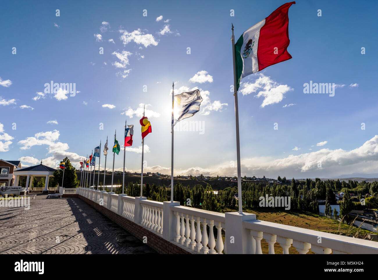 International flags flying; Hotel Unique Luxury; El Calafate; Argentina Stock Photo