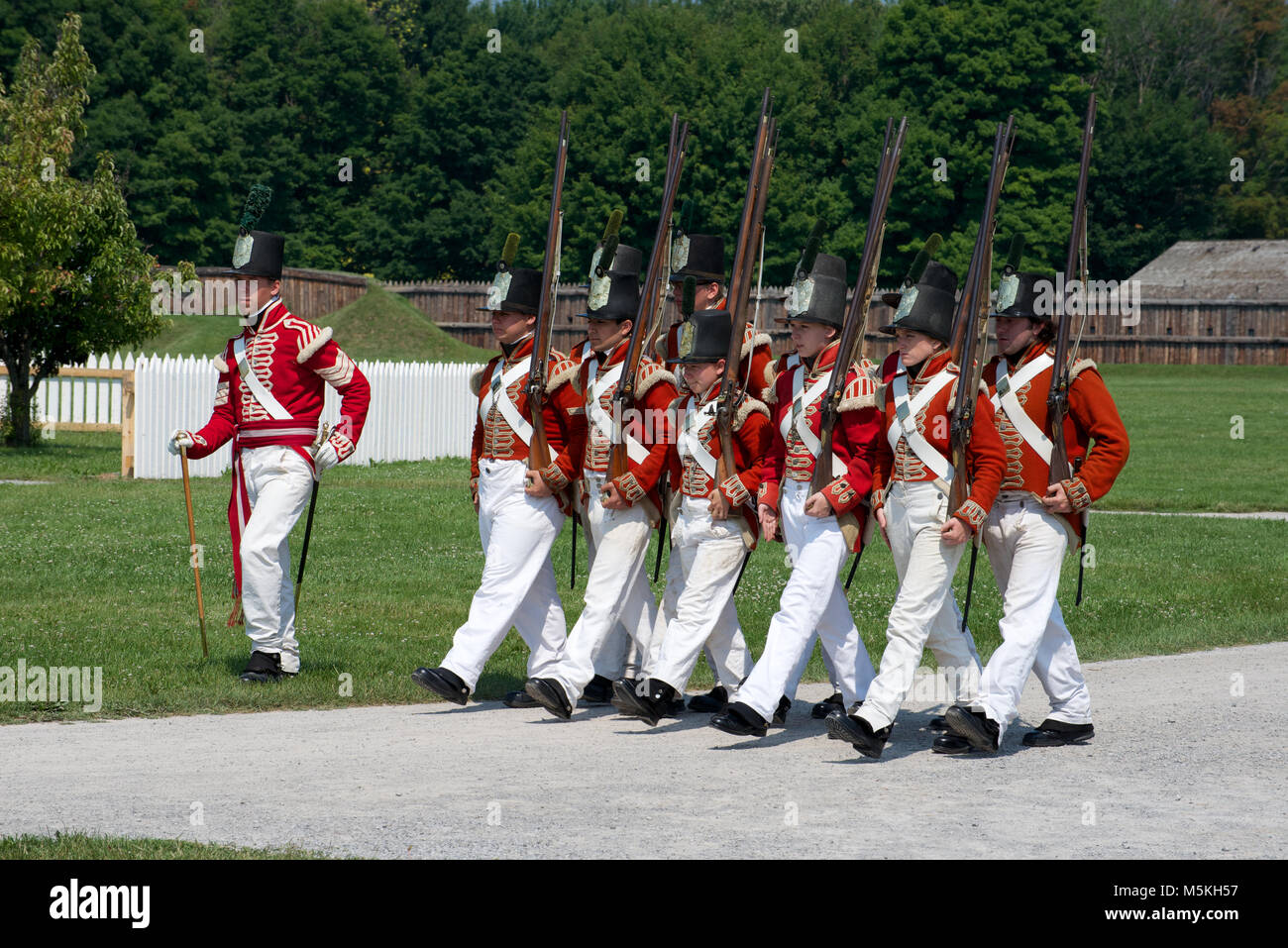 Soldiers marching at the Fort George Historic Site, Niagara-on-the-Lake, Ontario, Canada Stock Photo