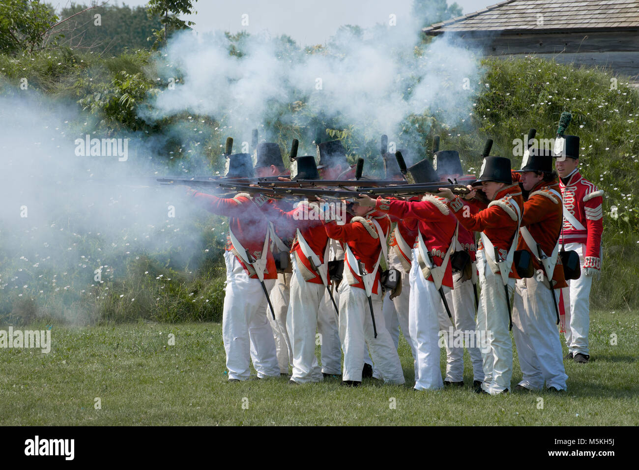 A musket firing demonstration at the Fort George Historic Site, Niagara-on-the-Lake, Ontario, Canada Stock Photo