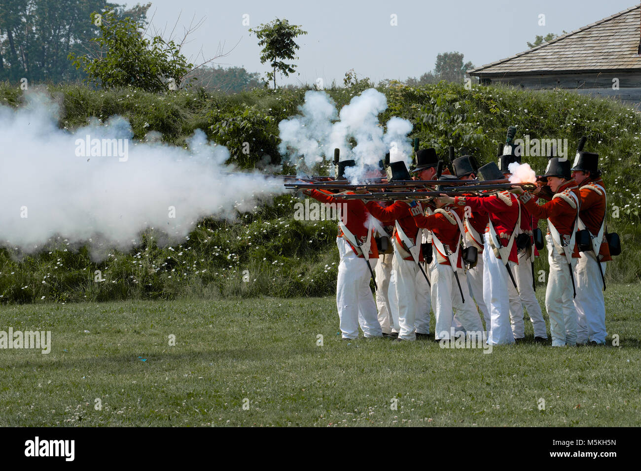 A musket firing demonstration at the Fort George Historic Site, Niagara-on-the-Lake, Ontario, Canada Stock Photo