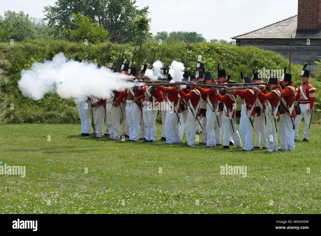 A musket firing demonstration at the Fort George Historic Site, Niagara-on-the-Lake, Ontario, Canada Stock Photo