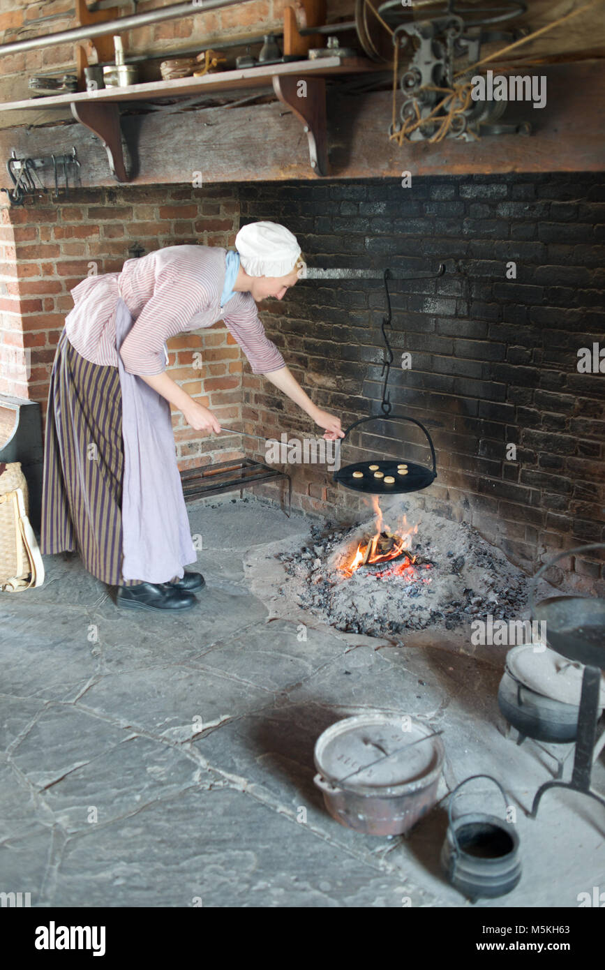 A baking demonstration in the Officers Kitchen at Fort George Historic Site, Niagara-on-the-Lake, Ontario, Canada Stock Photo