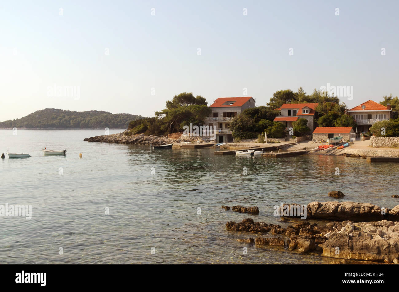 Traditional village on the shore of the Adriatic sea, house near the sea. Prizba village island of Korcula Stock Photo