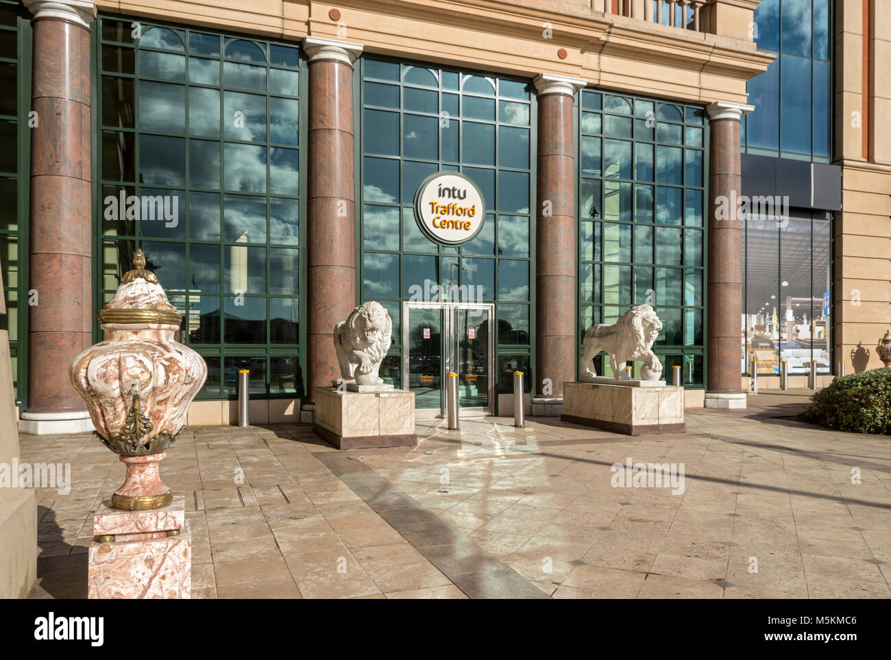 Vase and lion sculptures at the entrance to Barton Square at the intu Trafford Centre, Manchester, UK Stock Photo