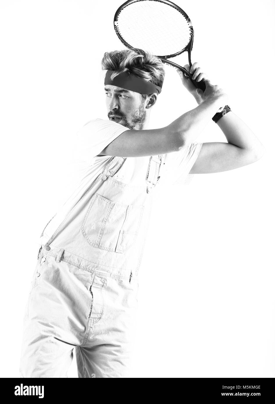 Male tennis player with racket in action Stock Photo Alamy