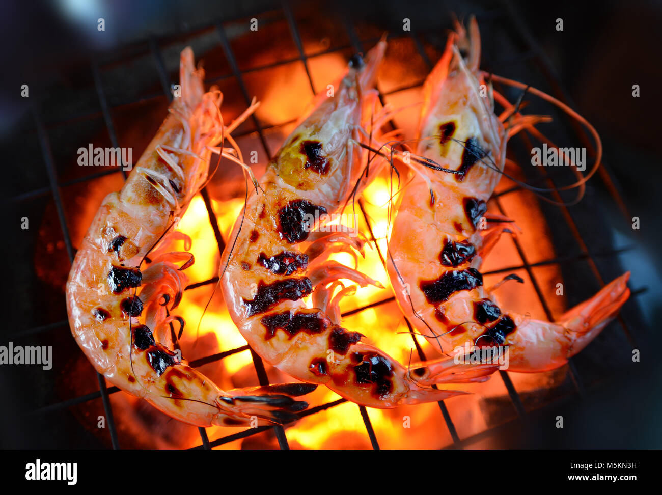 Grill Shrimp in  hot fire the best of hot  seafood Stock Photo