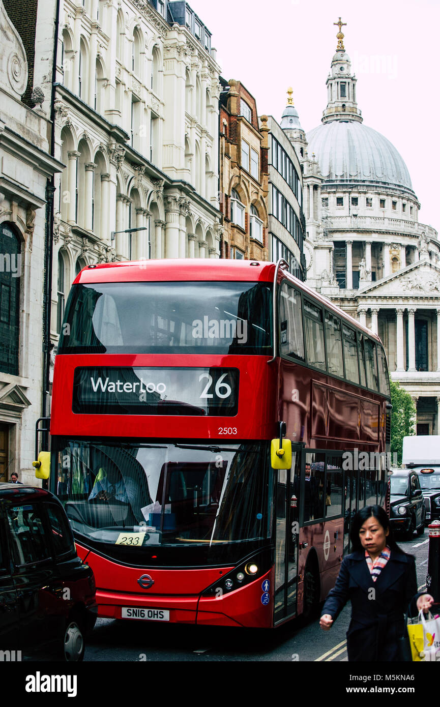 A London bus passes through Fleet Street in London with St Paul's in the background Stock Photo
