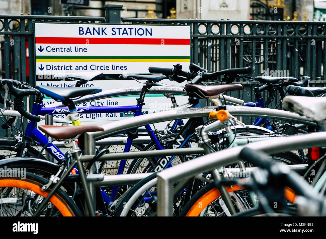 Bikes are stacked up at a bicycle rack in Bank Station, the City of