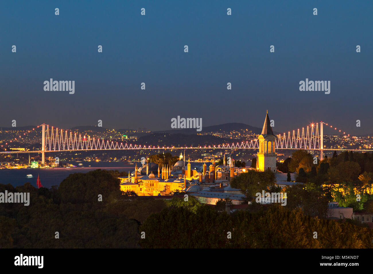 Night view over the Topkapi Palace and Bosphorus Bridge, in Istanbul, Turkey. Stock Photo