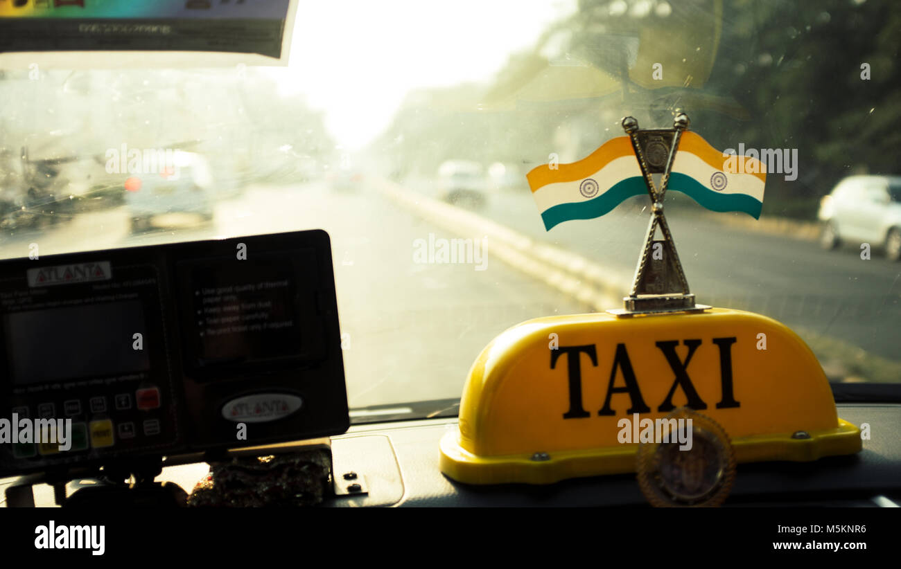 The inside of a taxi with the India flag is seen in Delhi, India Stock Photo