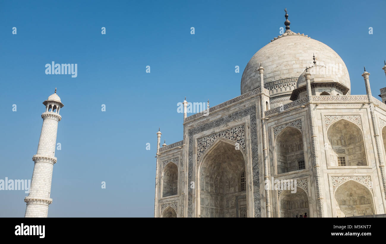 The Taj Mahal with construction on one of its pillars is seen during a cloudless sunny day in Agra, India Stock Photo