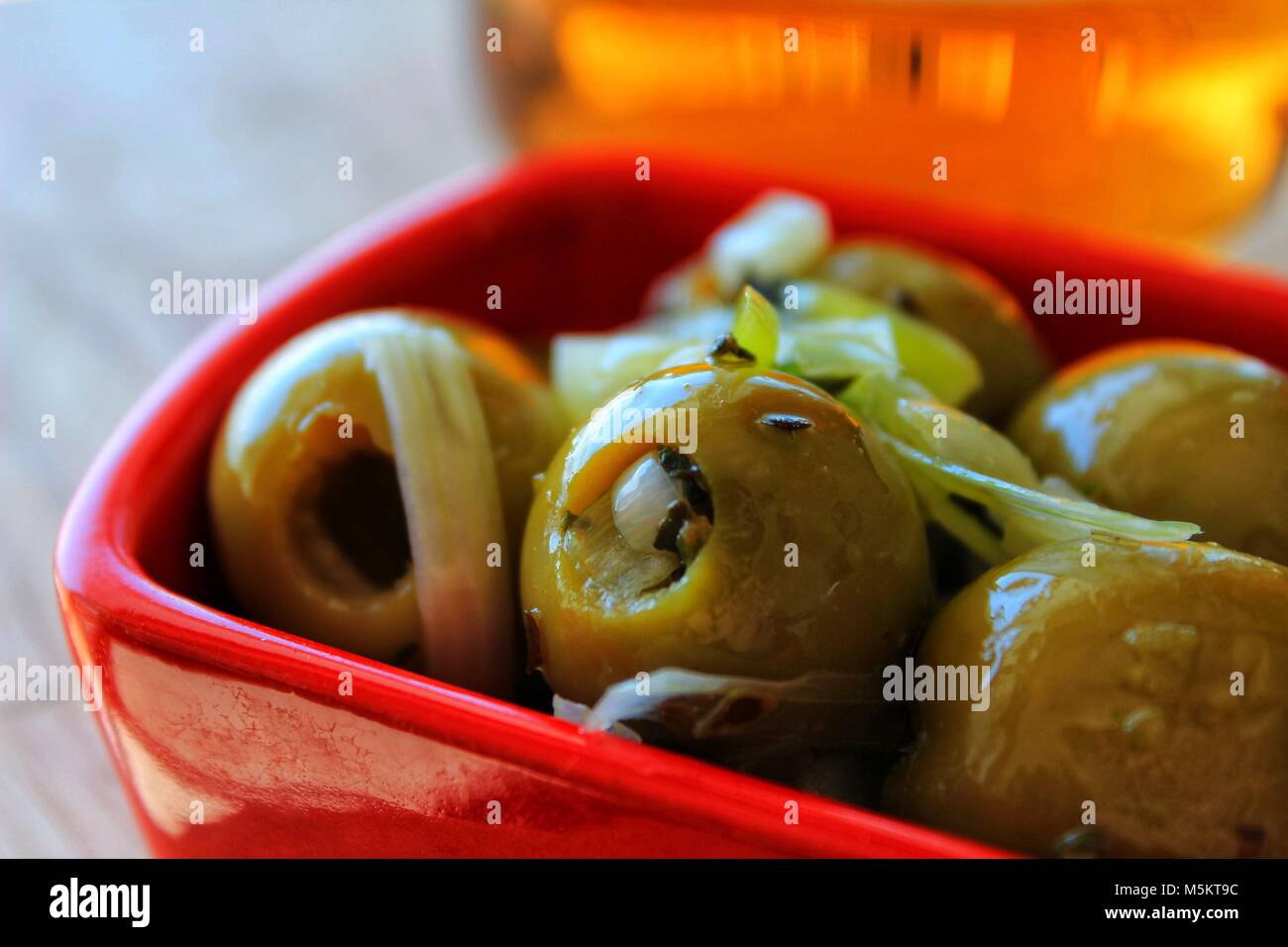 Delicious Spanish tapa. Olives with onion, oregano and olive oil served