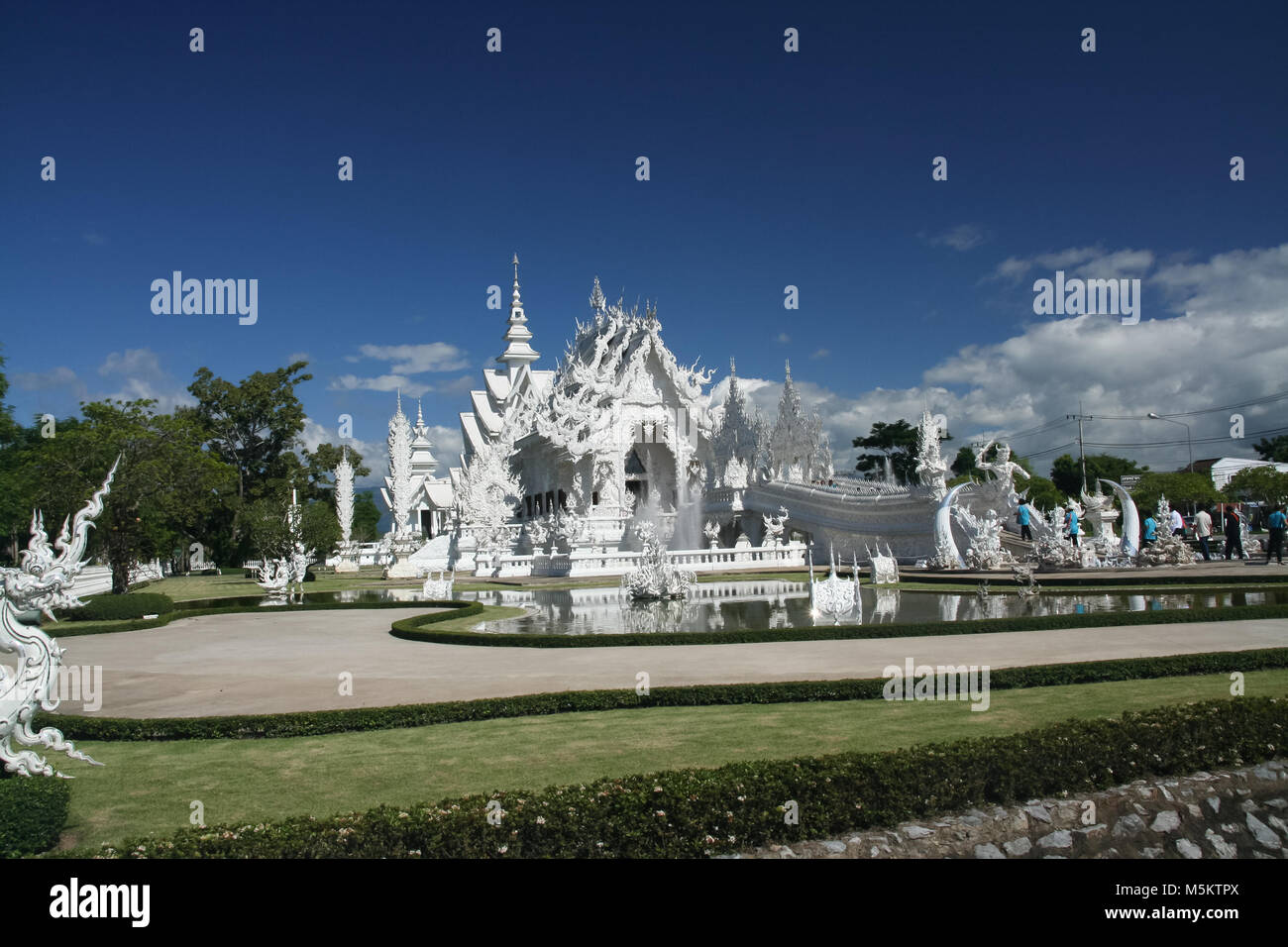 CHIANGRAI , THAILAND- JULY 6 2011: Wat (Temple) Rong Khun, White temple ...