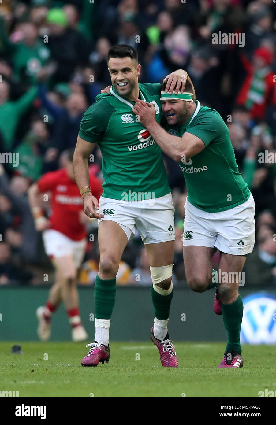 Ireland's Conor Murray (left) celebrates with team mate Fergus McFadden after converting a penalty during the RBS Six Nations match at the Aviva Stadium, Dublin. Stock Photo