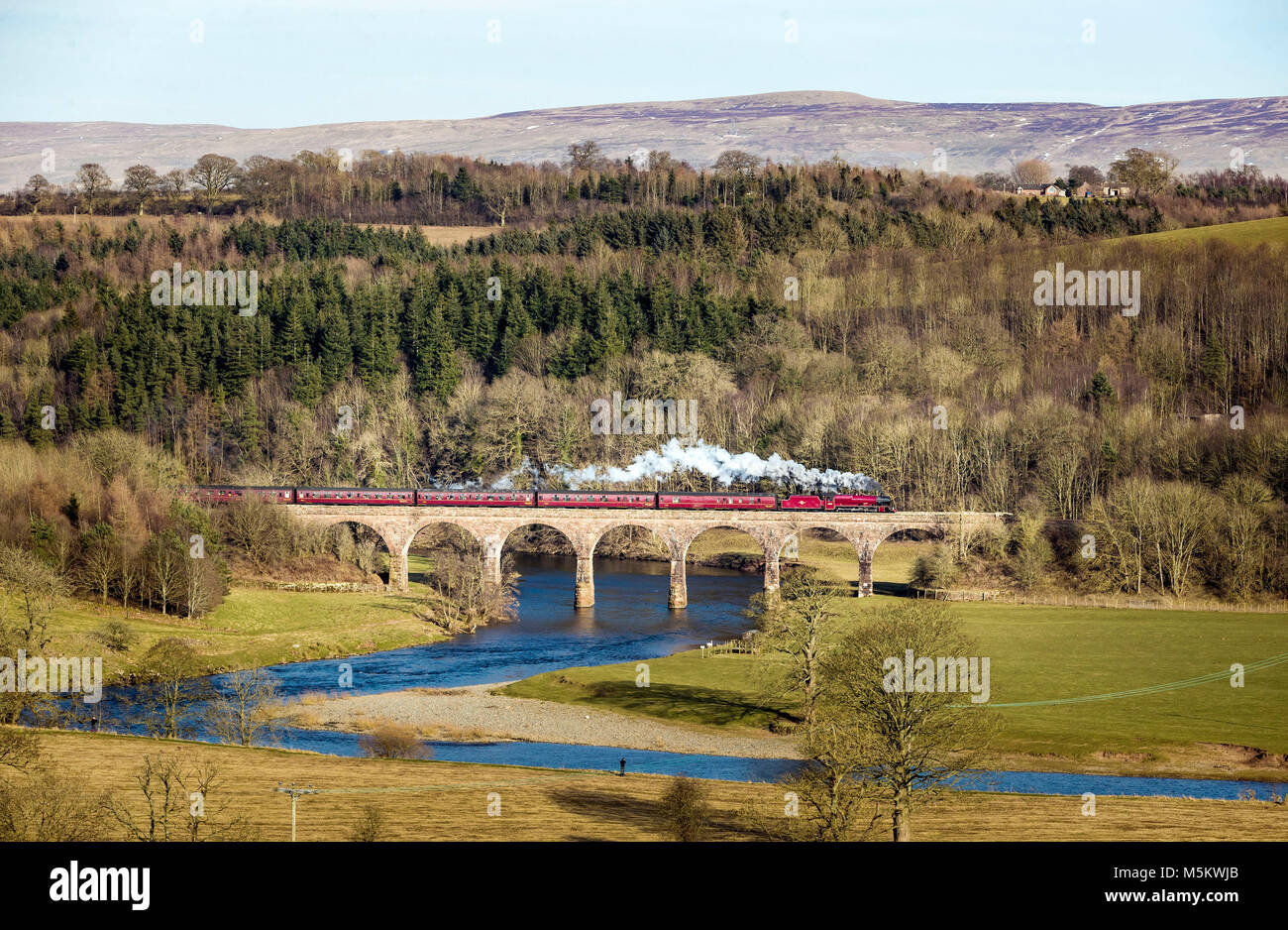 LMS Jubilee Class 6MT 4-6-0 no 45699 Galatea locomotive goes over the Eden Lacy Viaduct in Cumbria. Stock Photo