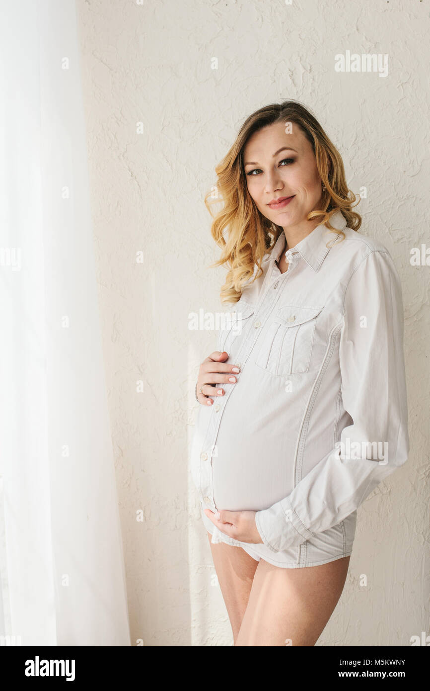 Beauty in white erotic pregnant Teen Mom