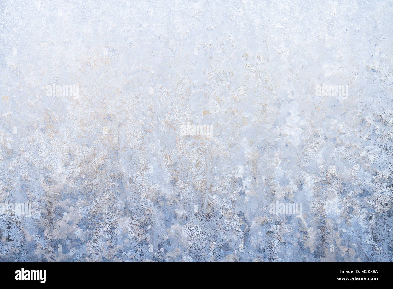 Winter frosty patterns on the frozen ice window Stock Photo - Alamy