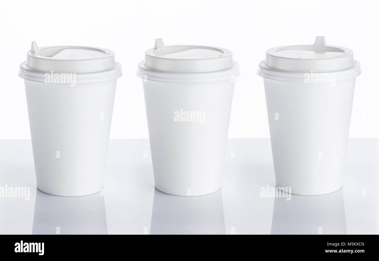 White disposable paper cup isolated on white background Stock Photo - Alamy