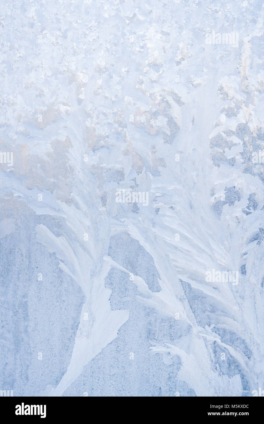 Winter frosty patterns on the frozen ice window Stock Photo - Alamy
