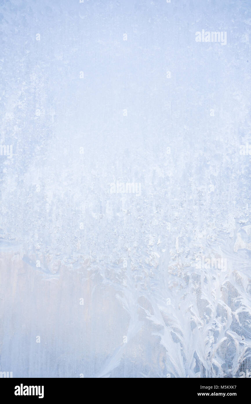 Winter frosty patterns on the frozen ice window Stock Photo - Alamy