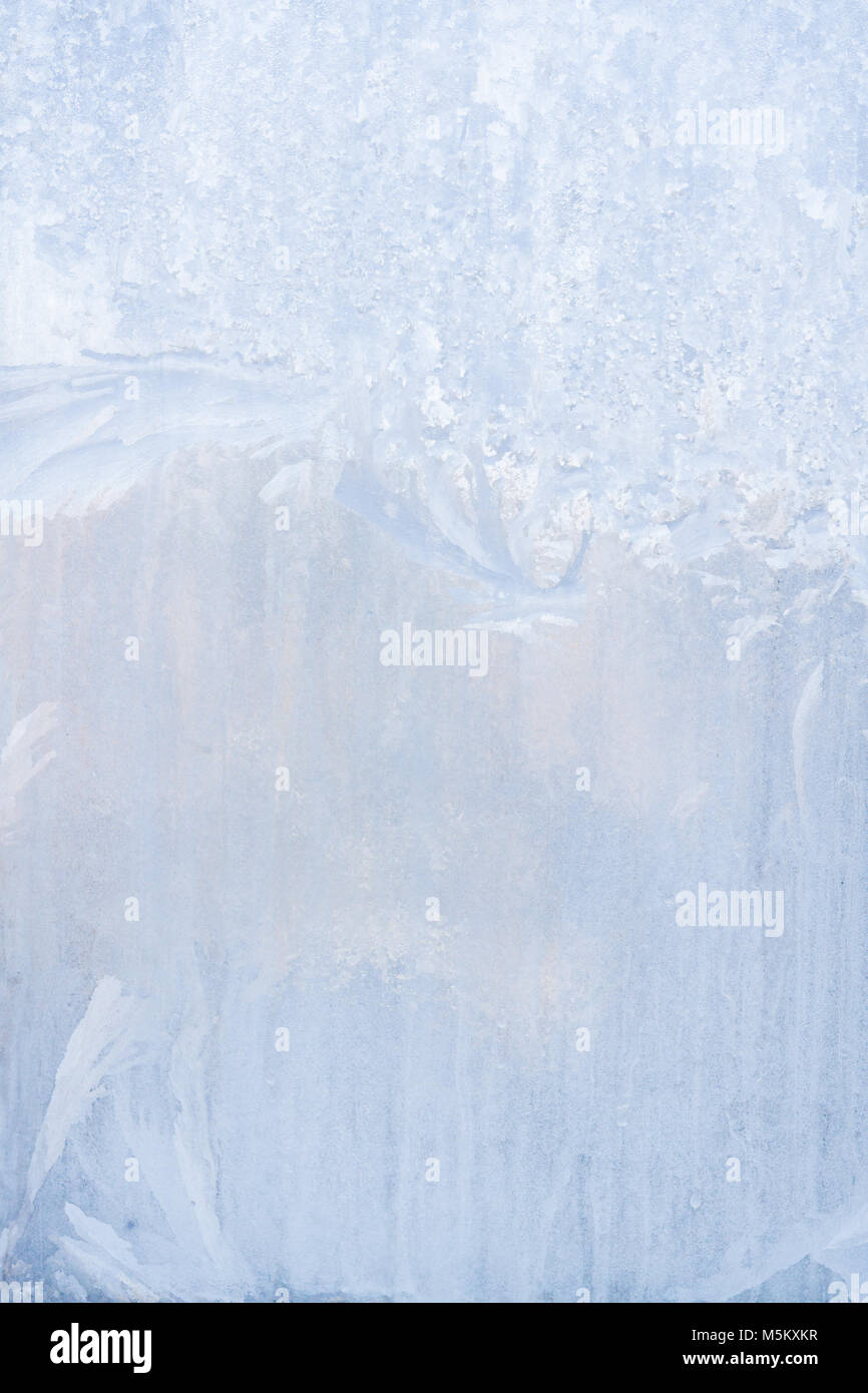 Winter frosty patterns on the frozen ice window Stock Photo - Alamy