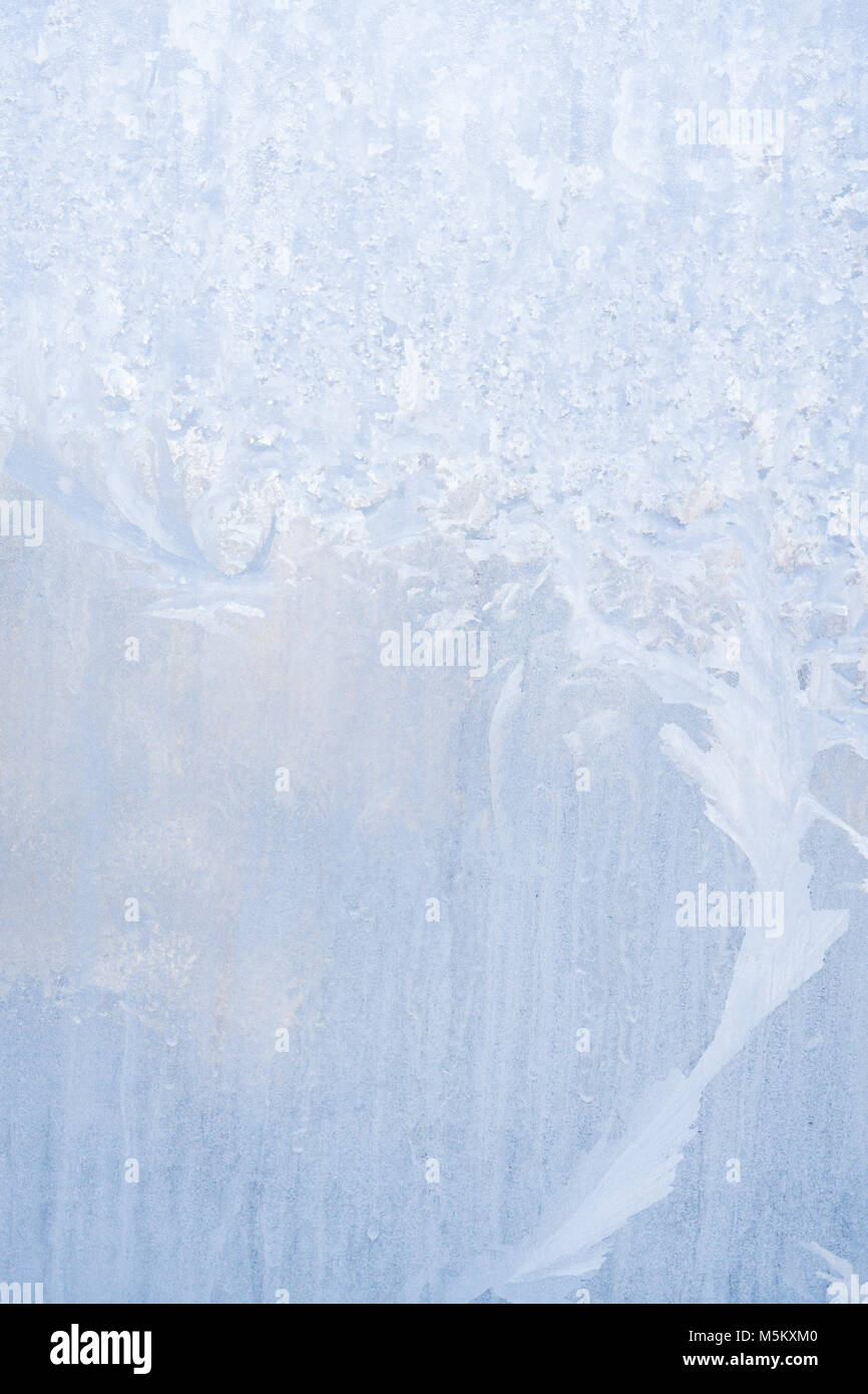 Winter frosty patterns on the frozen ice window Stock Photo - Alamy