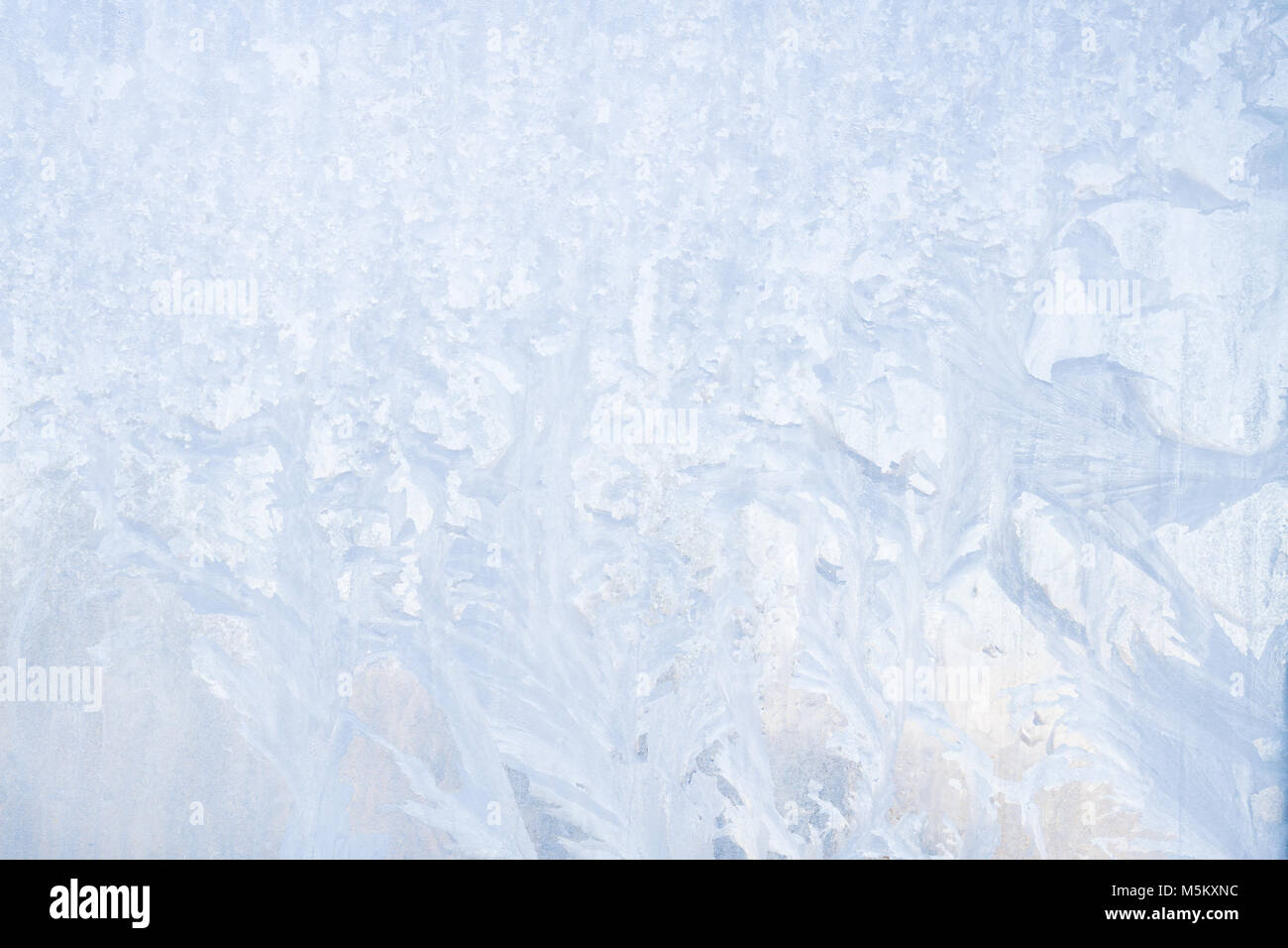 Winter frosty patterns on the frozen ice window Stock Photo - Alamy