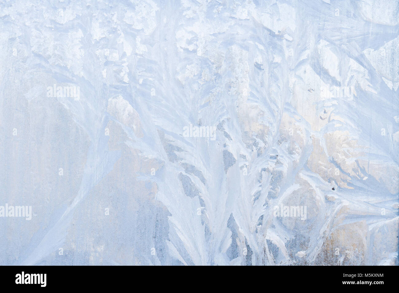 Winter frosty patterns on the frozen ice window Stock Photo - Alamy