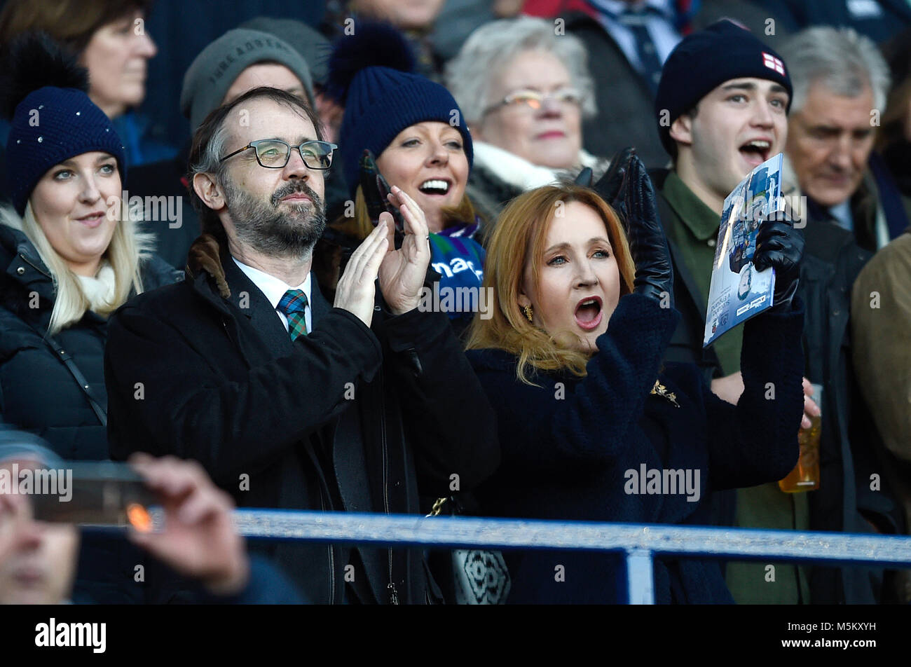 J.K. Rowling and husband Neil Murray in the stands before the RBS Six Nations match at BT Murrayfield, Edinburgh. Stock Photo