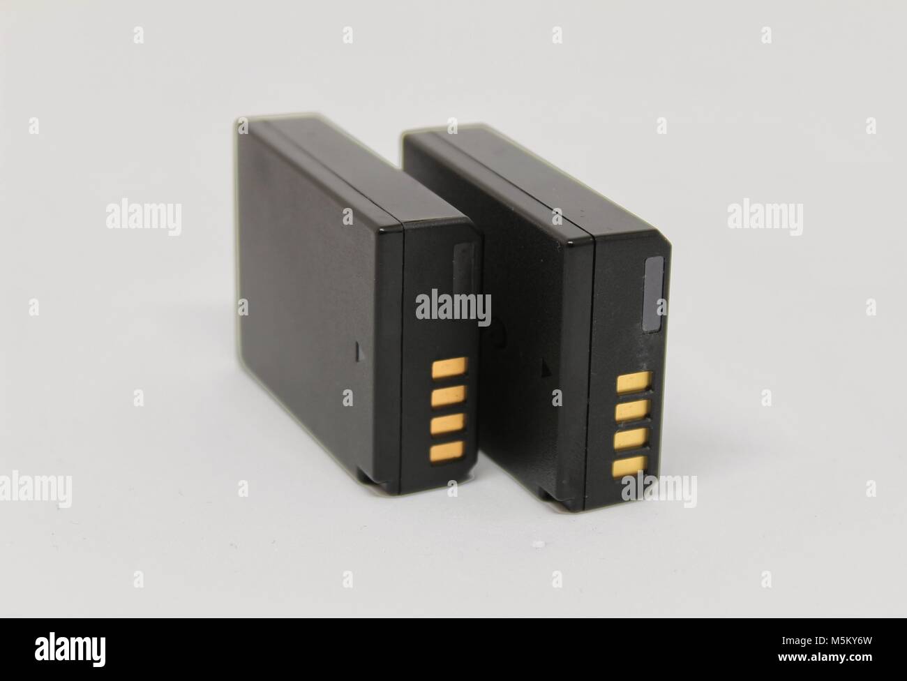 Digital camera batteries on white background Stock Photo Alamy