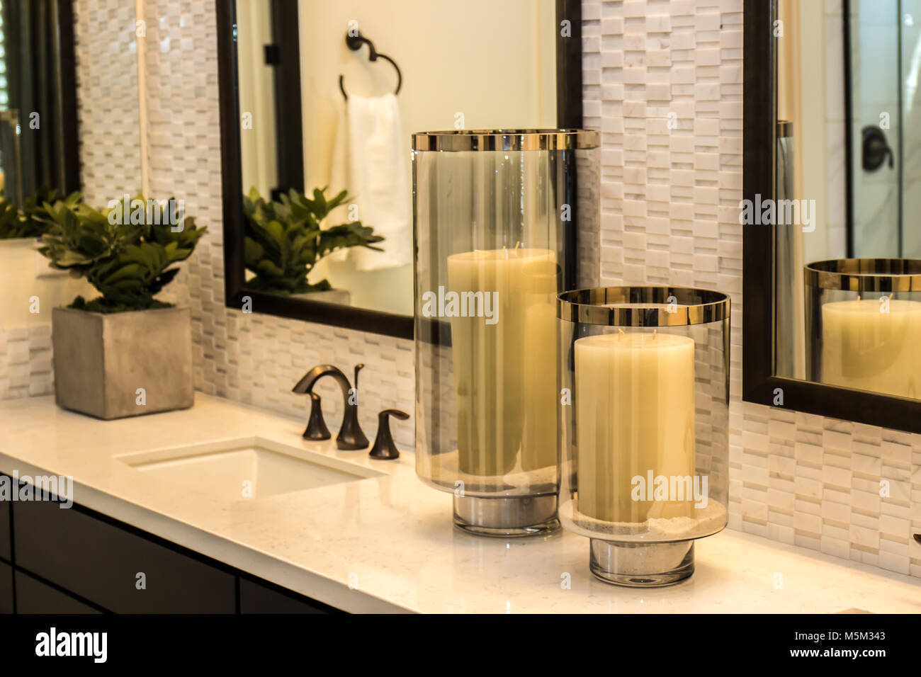 Modern Bathroom With Glass Containers With Candles Stock Photo Alamy