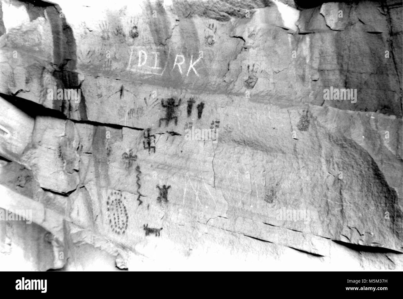 Grand Canyon Historic Bright Angel Trail Pictographs . PICTOGRAPH PANEL DEFACED BY GRAFFITI NEAR  TWO-MILE CORNER ON THE BRIGHT ANGEL TRAIL. 10 OCT 1977. Stock Photo