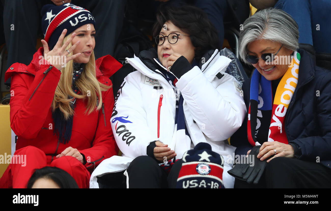 Pyeongchang, South Korea. 24th Feb, 2018. Ivanka Trump (l), daughter of and advisor to US President Donald Trump, sits in the stands to watch the men's big air snowboarding finals at the Alpensia Ski Jumping Centre in Pyeongchang, South Korea, 24 February 2018. Next to her is the wife of South Korean president Kim Jung-Sook (c) and the South Korean Foreign Minister Kang Kyung Wha (r). Credit: Daniel Karmann/dpa/Alamy Live News Stock Photo