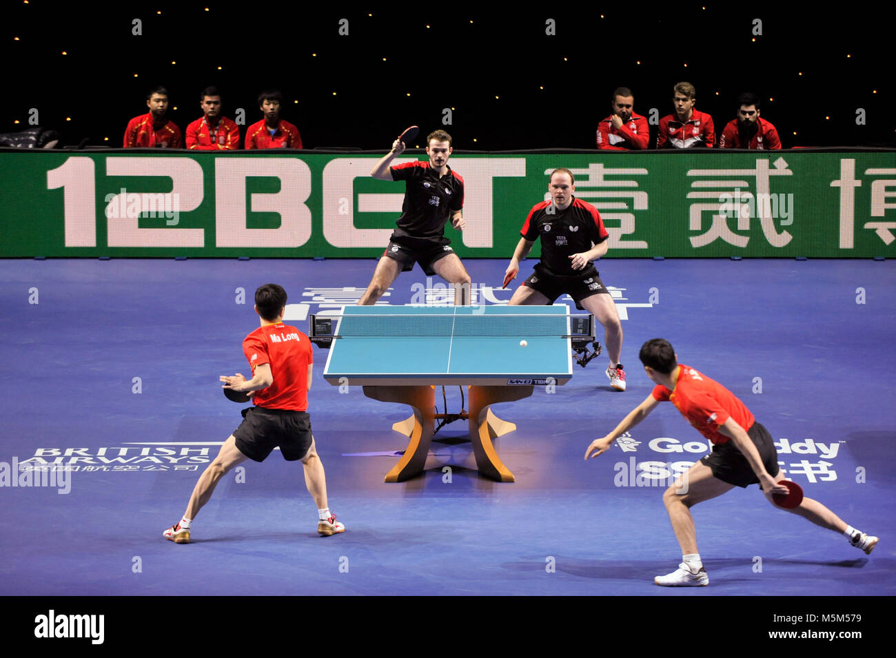 London, UK.  24 February 2018. Samuel Walker (ENG) and Paul Drinkhall (ENG) take part in a semi-final doubles match vs Xu Xin (CHN) and Ma Long (CHN) at the ITTF Team World Cup London 2018 taking place at the Copper Box Arena at the Queen Elizabeth Olympic Park. China would win 3-0 and progress to the final. Credit: Stephen Chung / Alamy Live News Stock Photo
