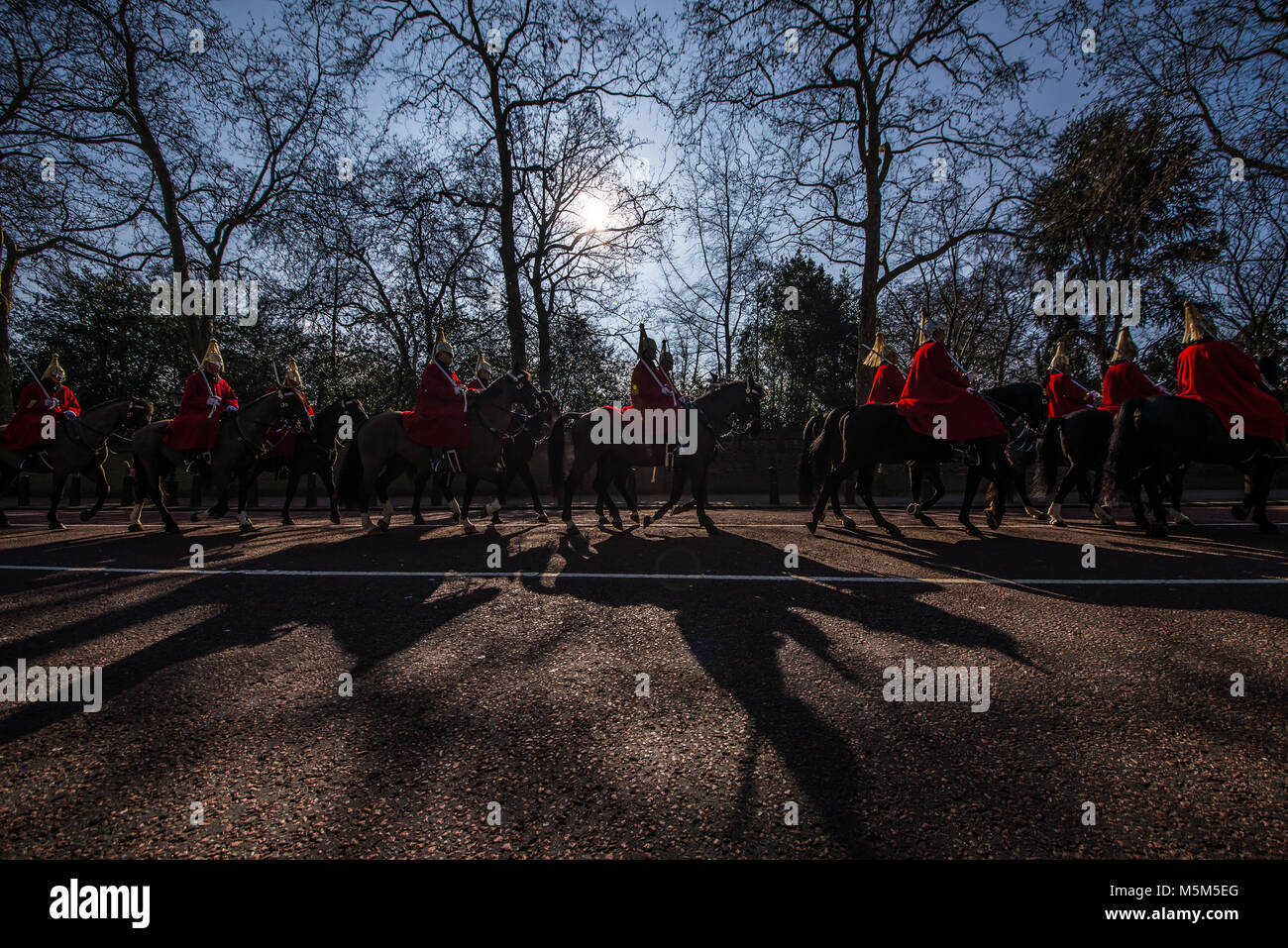 Changing of the guard mounted troops riding along Constitution Hill in