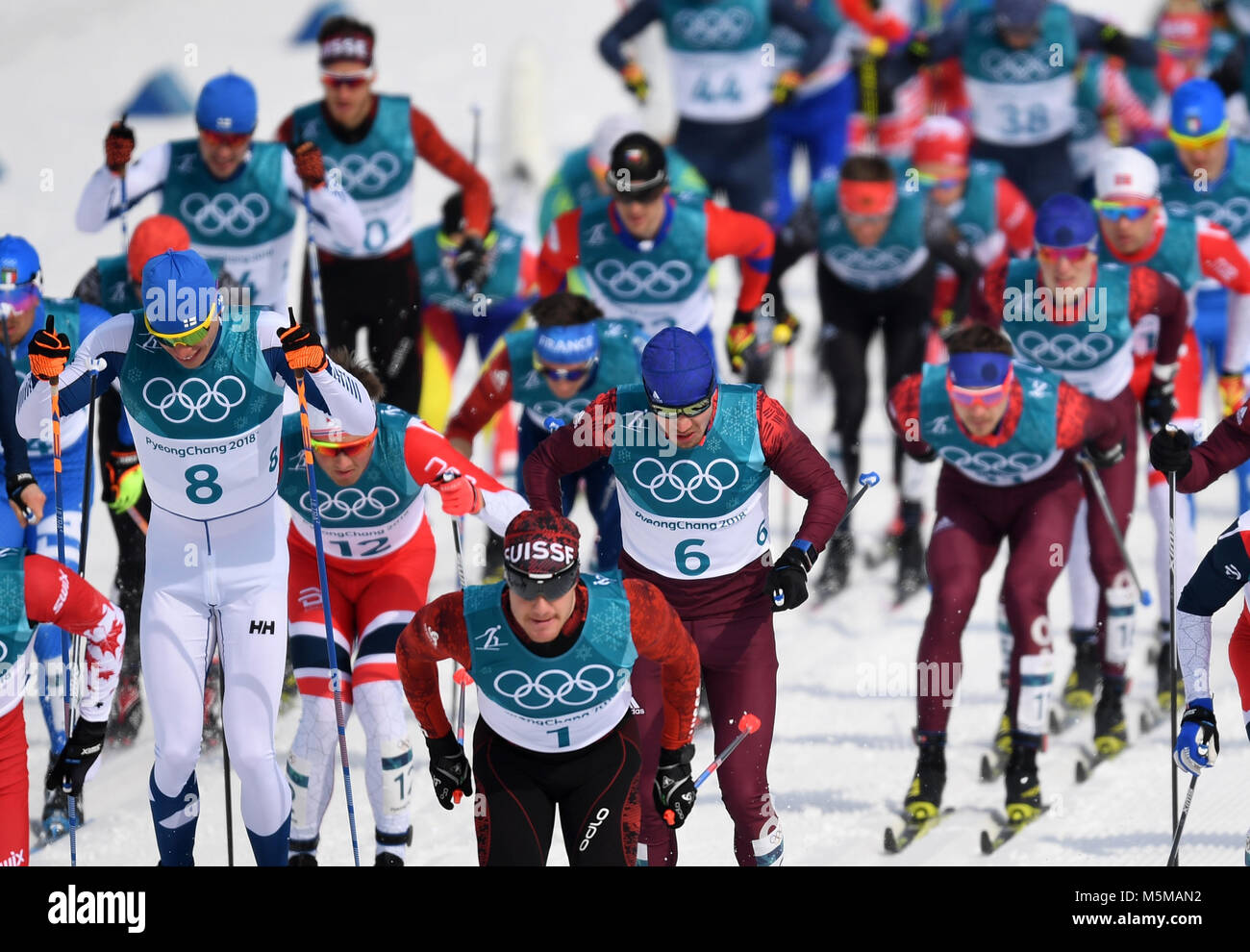 Pyeongchang, South Korea. 24th Feb, 2018. Skiers begin the 50 kms race in Pyeongchang, South Korea, 24 February 2018. Credit: Hendrik Schmidt/dpa-Zentralbild/dpa/Alamy Live News Stock Photo