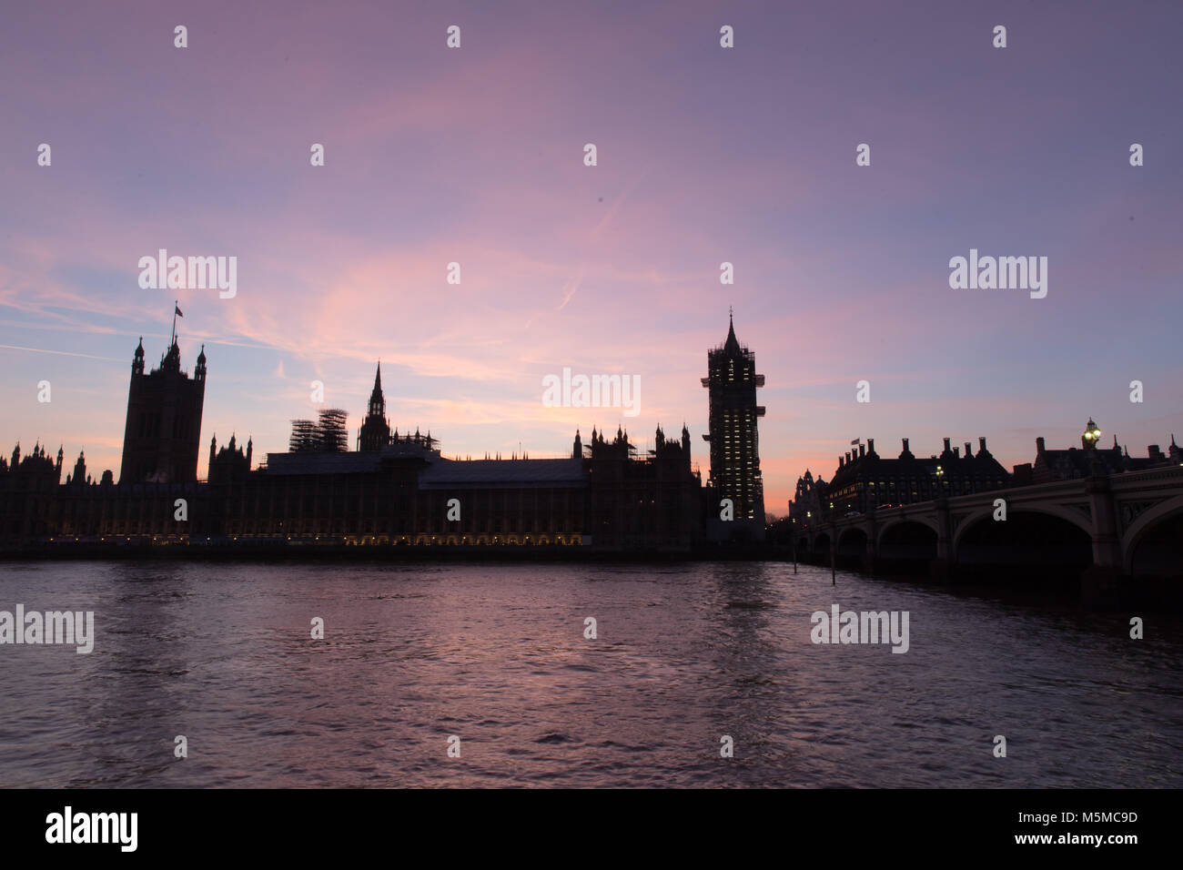 London, UK. 24th February, 2018. Houses of Parliamant and Big Ben, London, UK. 24th February 2018. Pink skies following a beautiful sunset.  Credit: Carol Moir/Alamy Live News. Stock Photo