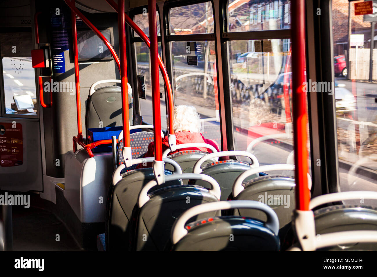 Lonely retired woman on the bus, lonelyness conception. Lonely person. Stock Photo