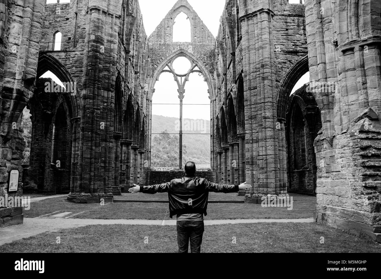 Feeling free at Tintern Abbey in wales Stock Photo