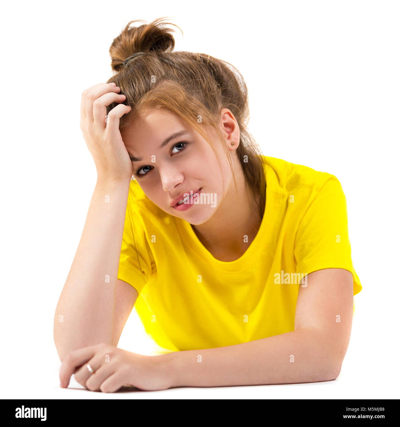 Portrait of a beautiful young girl on a white background Stock Photo ...