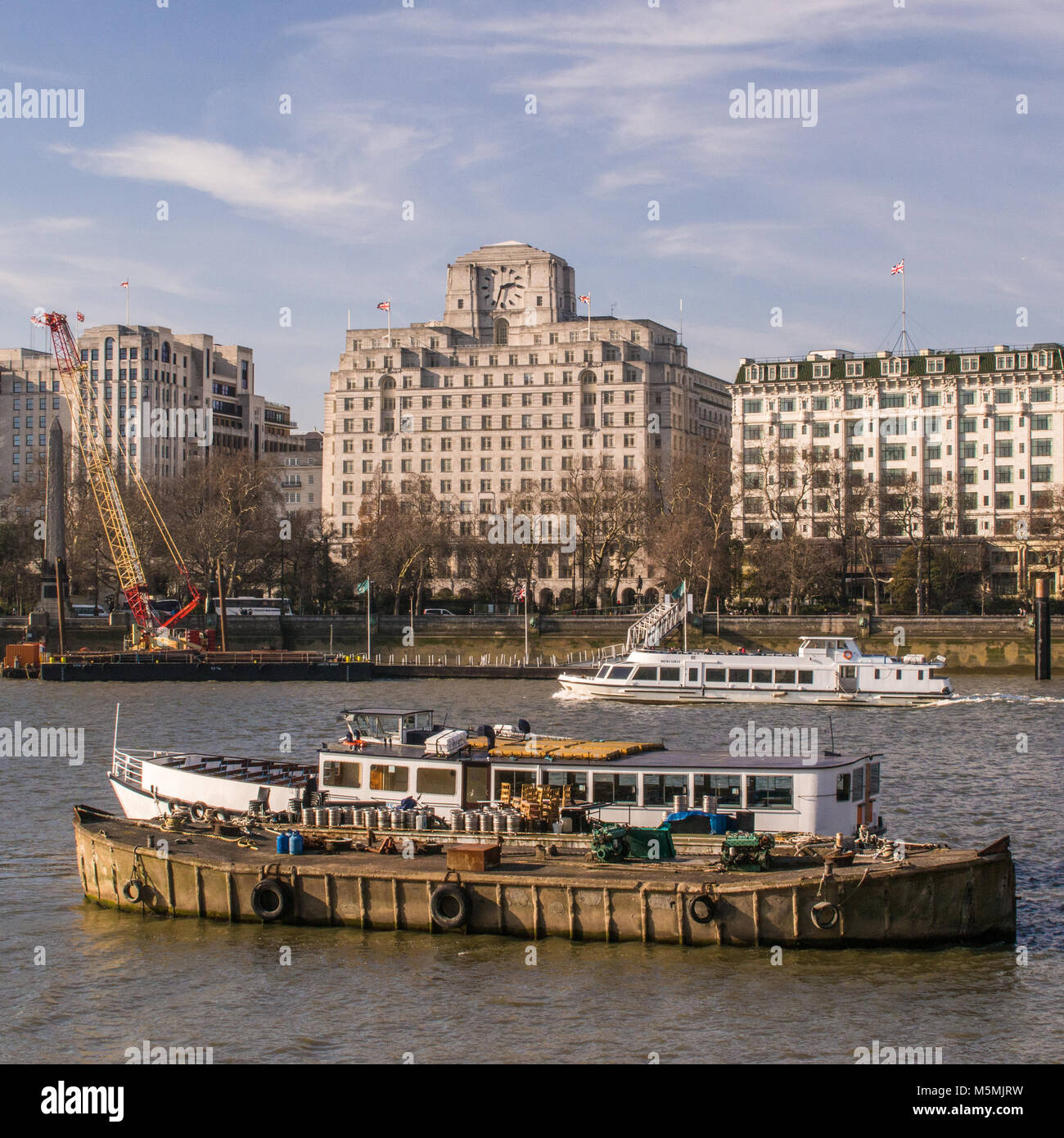 Looking Northwards across the Rver Thames from the Southbank between the Hungerford and Waterloo bridges Stock Photo
