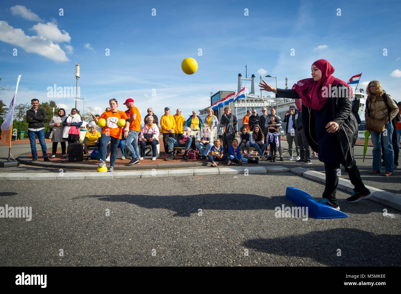 Playing curb ball. Dutch Championship Stock Photo - Alamy