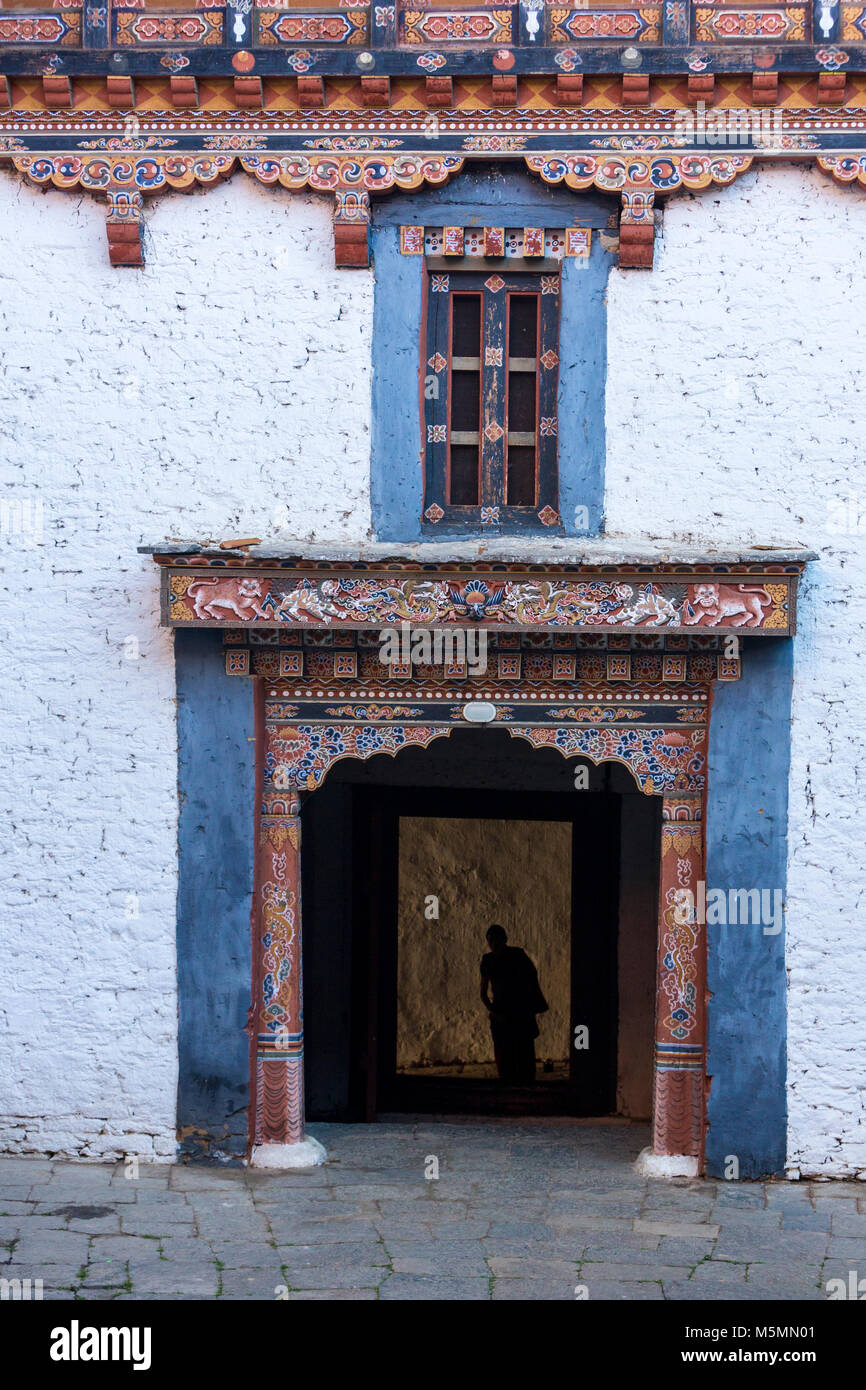 Trongsa, Bhutan.  Entryway into First Courtyard of The Trongsa Dzong (Monastery-Fortress), Viewed from Inside the Court. Stock Photo