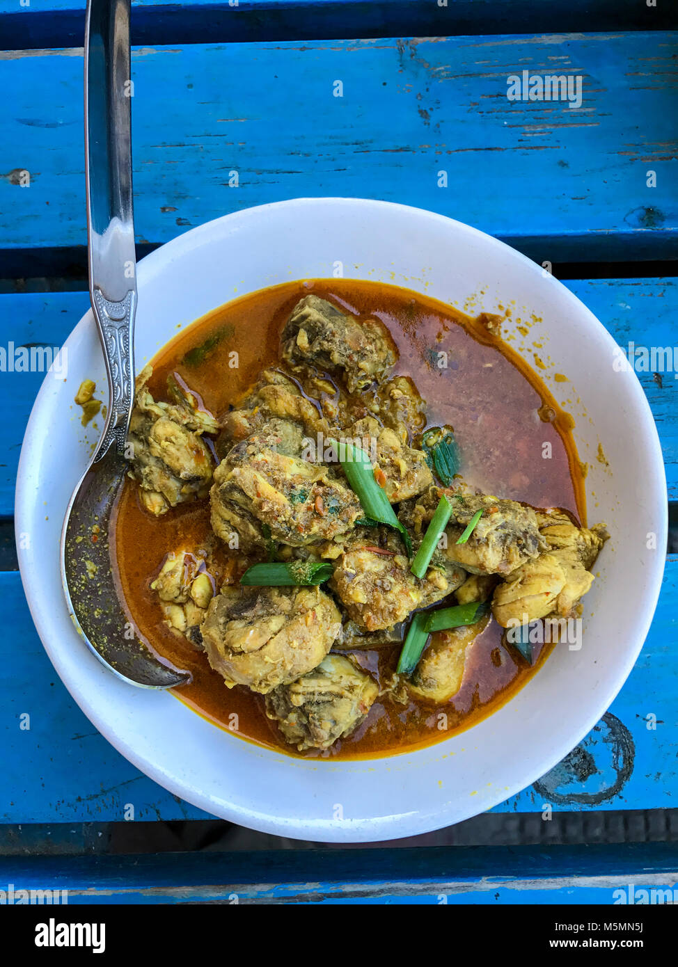 Trongsa, Bhutan.  Lunch of Curried Chicken. Stock Photo