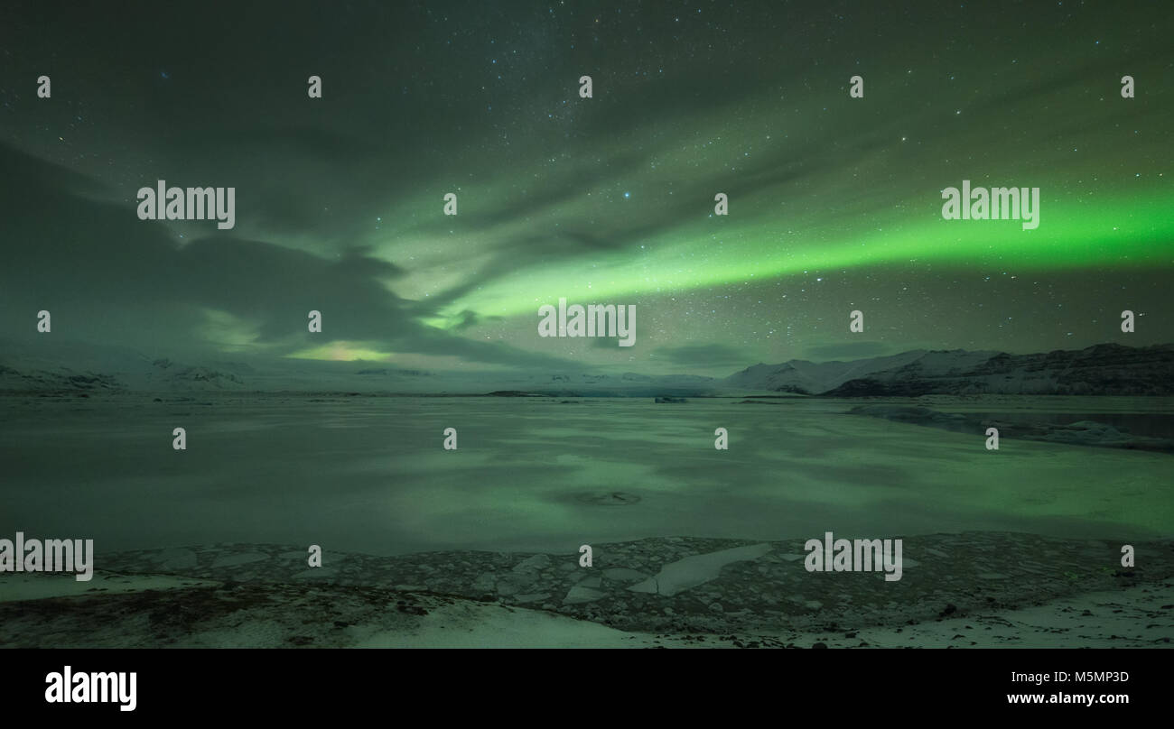 Aurora borealis over Jokulsarlon lagoon in Iceland Stock Photo