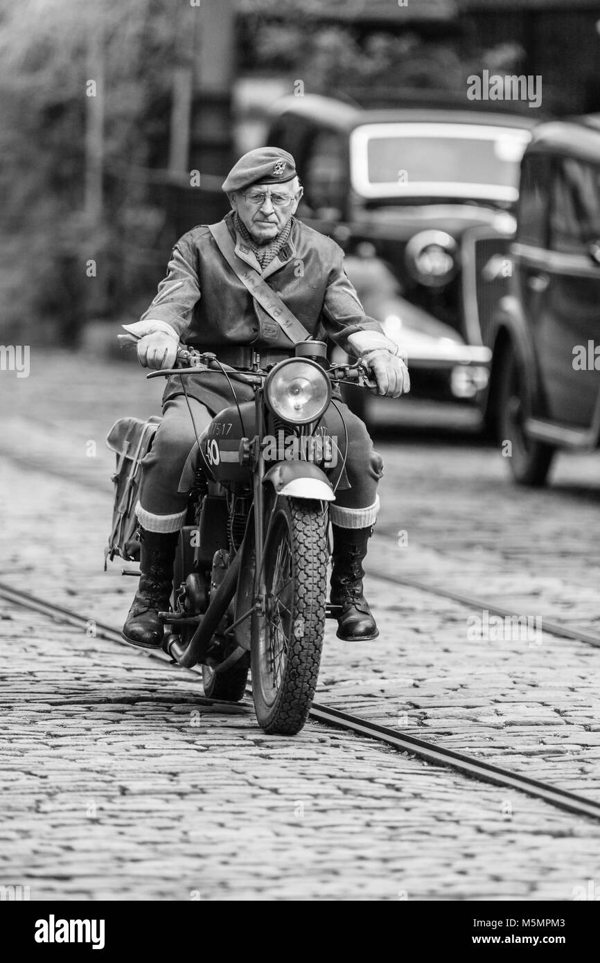 1940s Motorcycle dispatch Rider at the Re-enactment Weekend at the National Tramway Museum, Crich, Derbyshire, England, UK Stock Photo