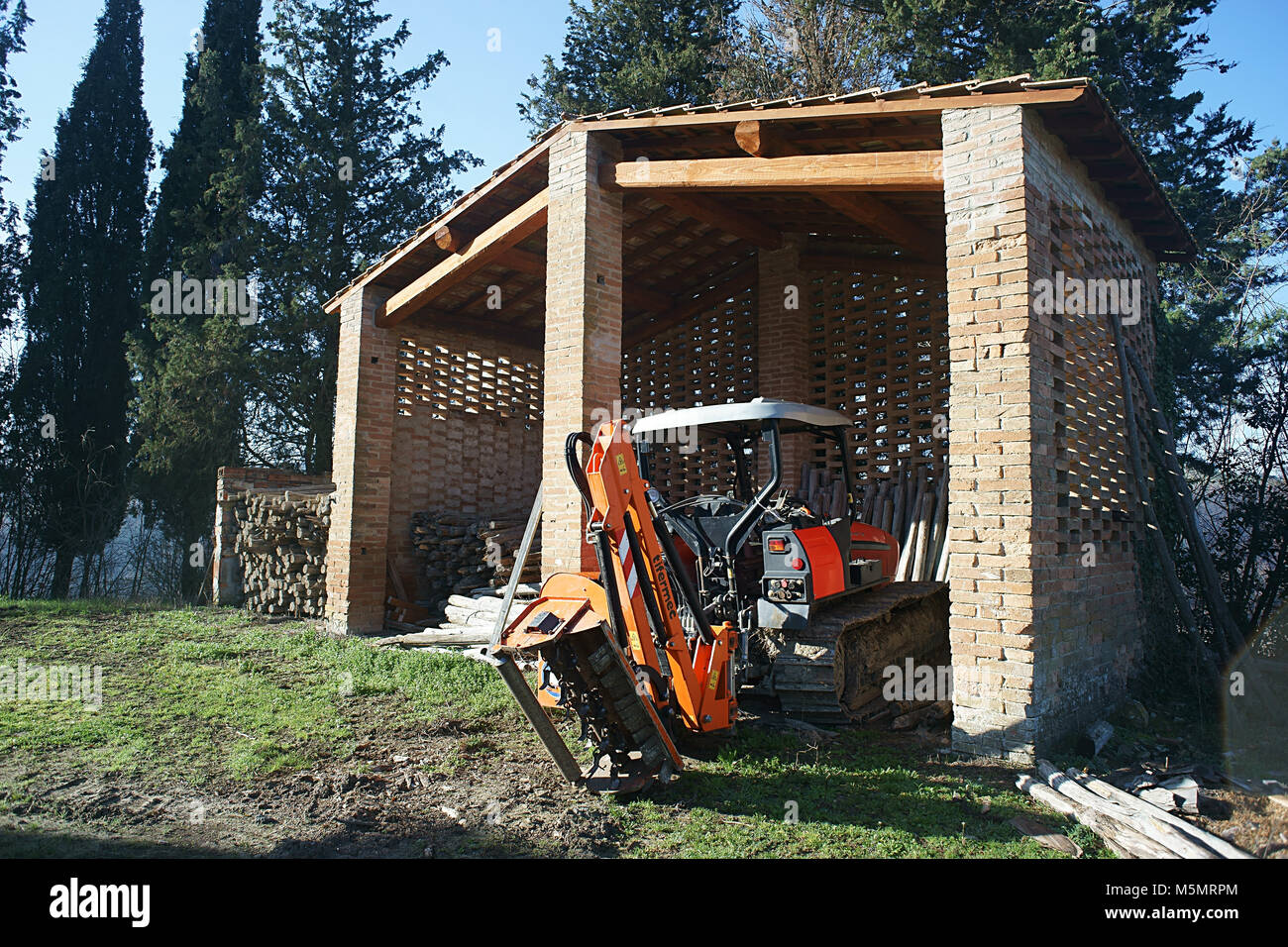 Tractor inside his box near Monterongriffoli, San Giovanni D'Asso, Tuscany, Italy Stock Photo