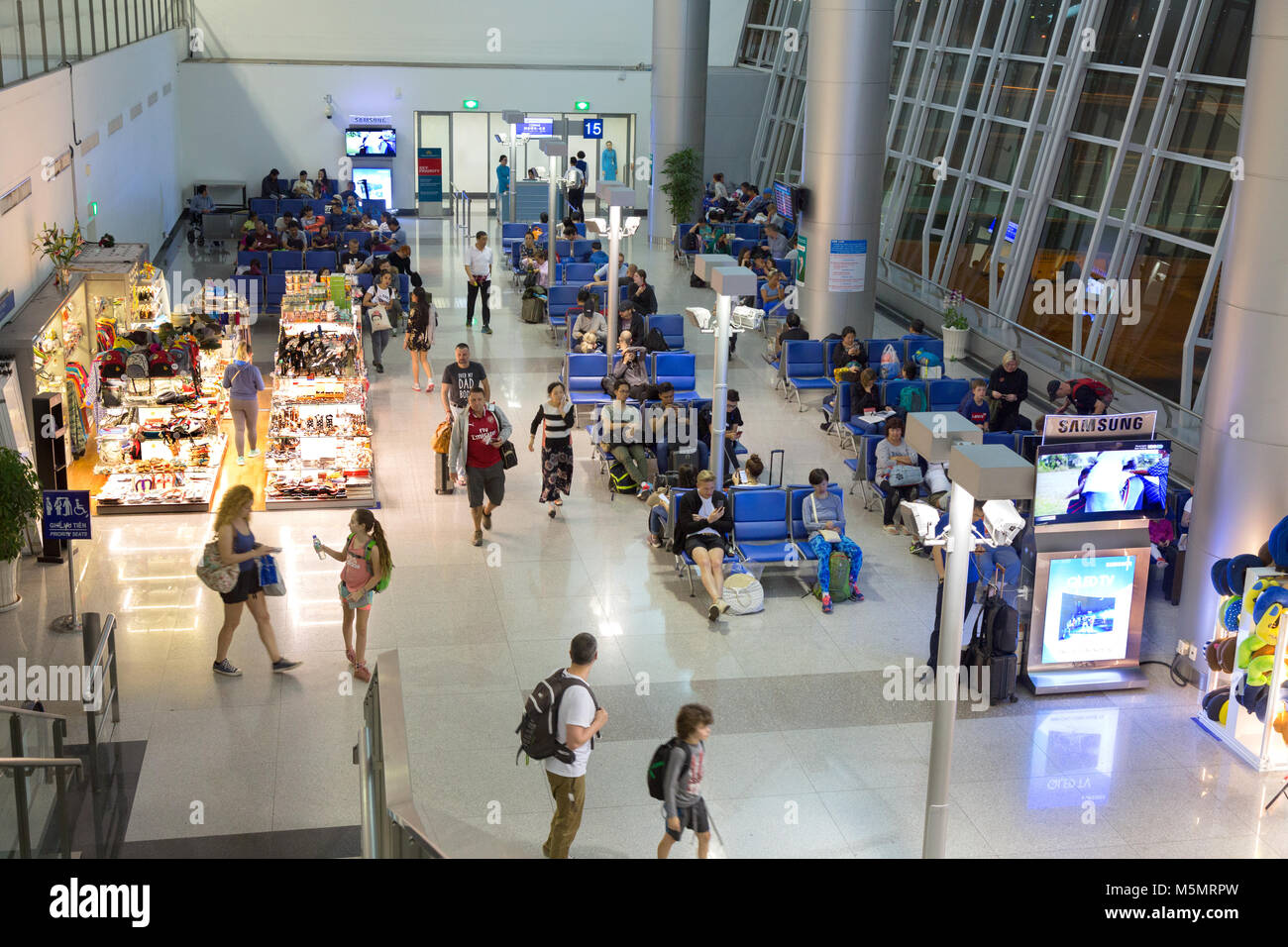 Passengers at the terminal gates, Ho Chi Minh airport ( Tan Son Nhat International airport) interior, Ho Chi Minh City, VBietnam, Asia Stock Photo