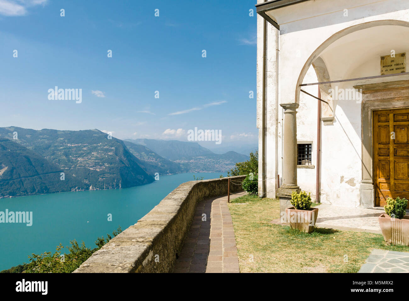 Santuario della Madonna della Ceriola, a small chapel at the top of the Island of Monte Isola overlooking Lake Iseo in Northern Italy. Stock Photo