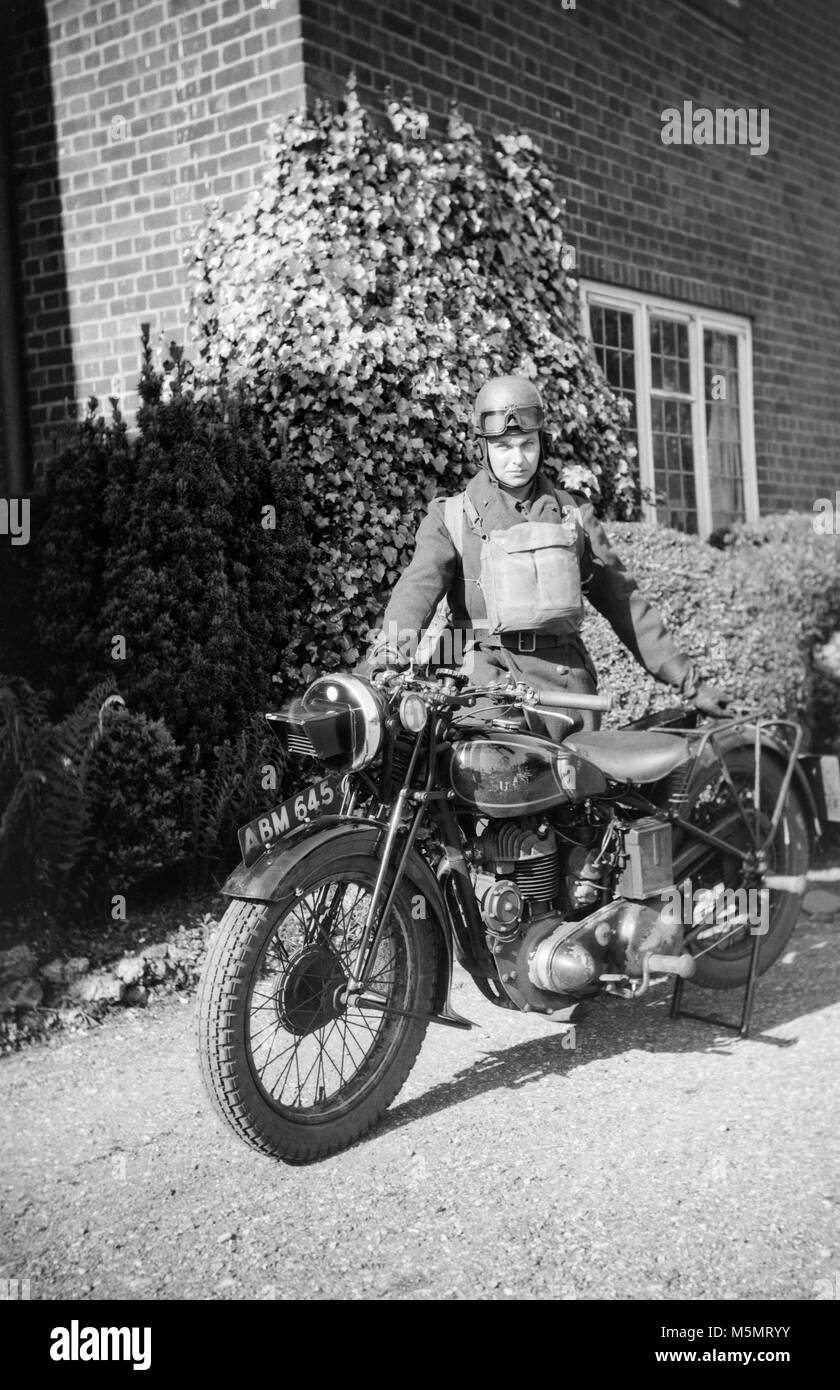 Photograph showing Dispatch Rider on a vintage Sunbeam 500 British Motorcycle. Stock Photo